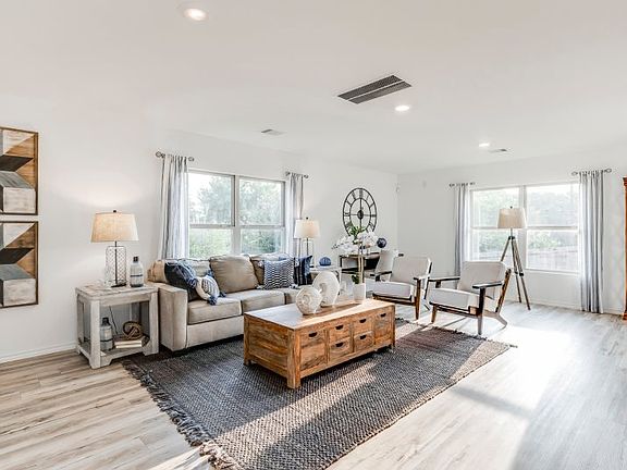 As the heart of this home, the spacious family room offers an ideal space for relaxing with loved on