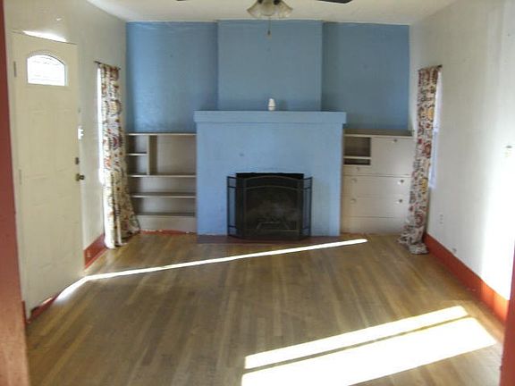 Living Room area with Wood Fireplace