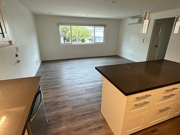Living Area with big window overlooking the street below