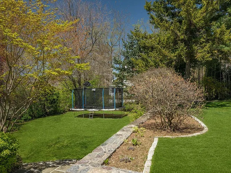 Backyard. Please note the trampoline will not be included in the rental.