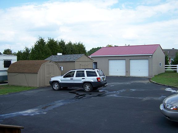 3  car detached garage with additional 2 car carport (out of view)