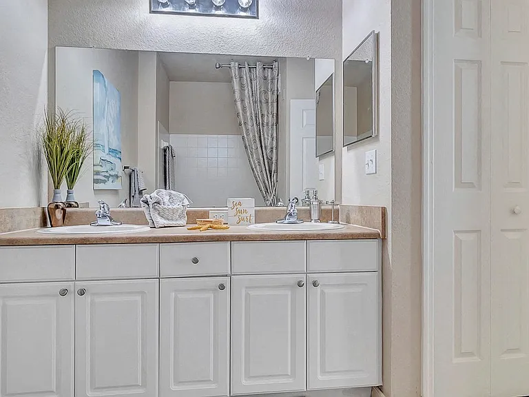 Large En-Suite Bathrooms with Tile Flooring