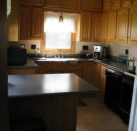 Kitchen
						:
						Pergo flooring, Corian countertops, ample cupboard space. Original design.