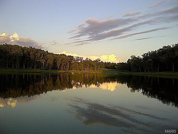 5.5 acre earthen dam lake built by Sellenriek Grading and Landscaping, MO premier golf course designer and builder.