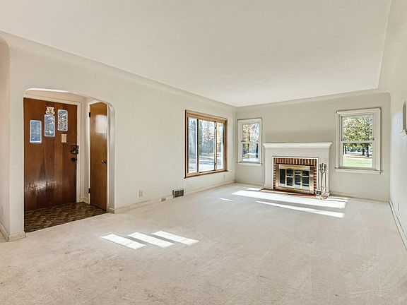 Spacious living room with fireplace