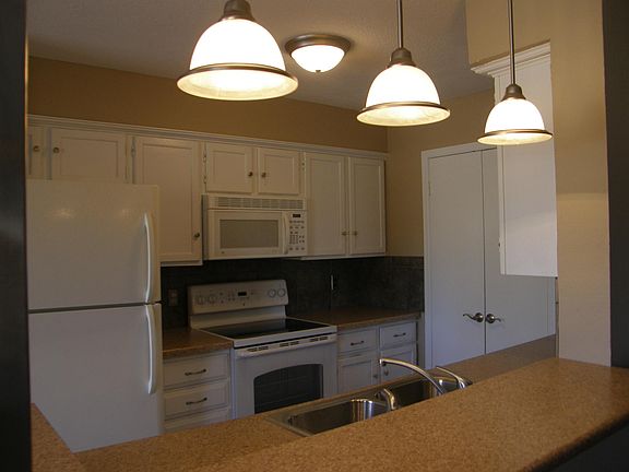 Kitchen, laundry room on right