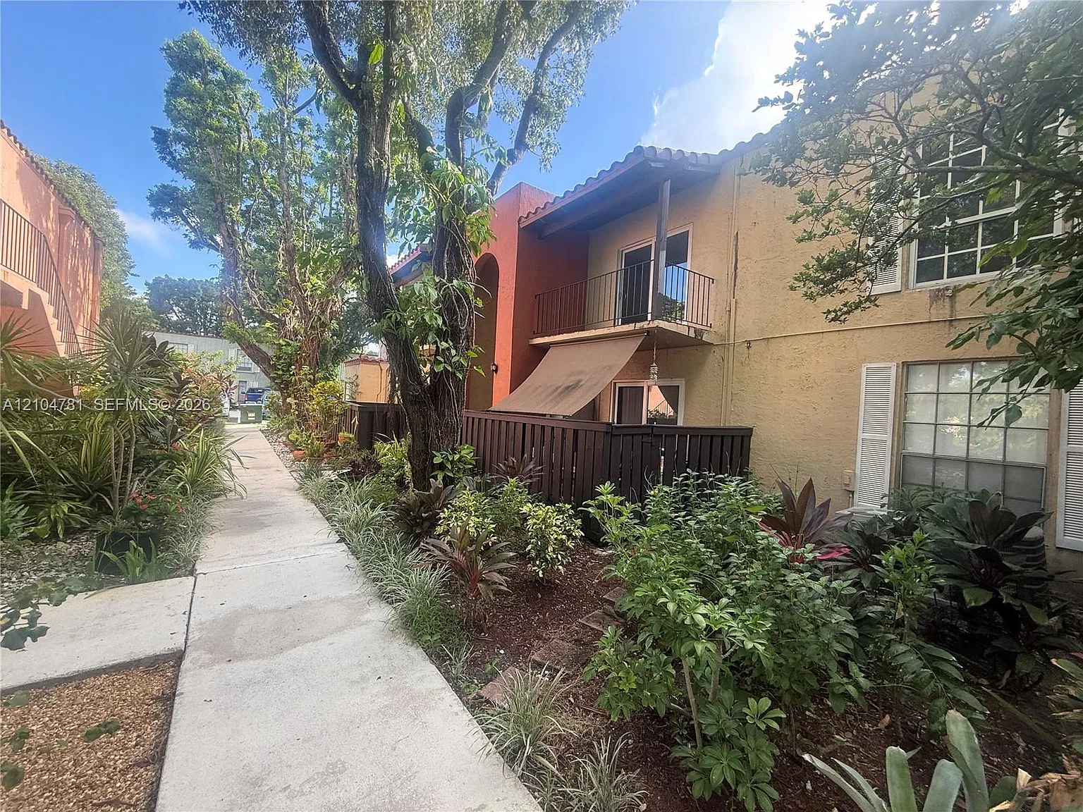 Spanish Trace Condo — Photo 1