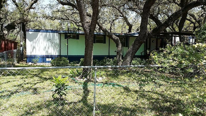 Single family home nestled on a beautiful fully shaded oak t