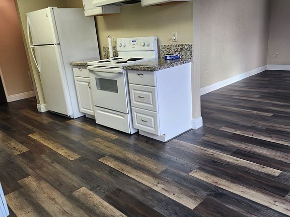 Kitchen and living room partial shown