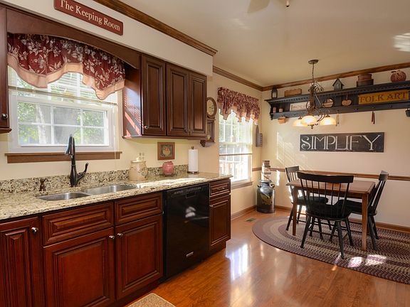 Beveled Edge Granite Counter Tops, Stainless Steel 60/40 Sinks and Faucet
