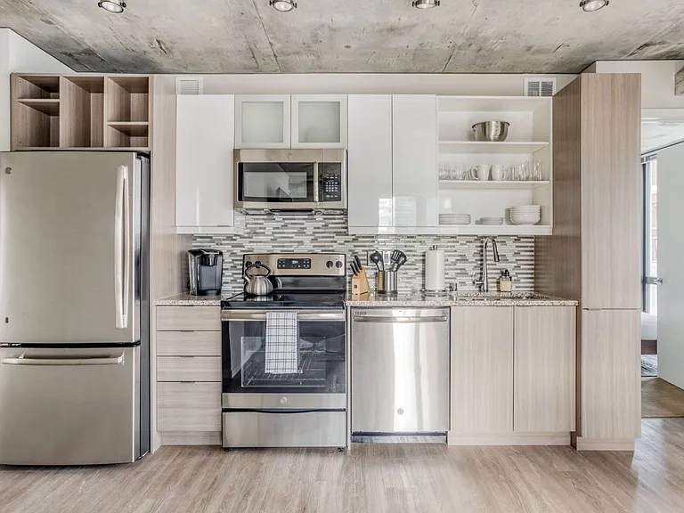 Two-Toned Cabinetry with Tile Backsplash