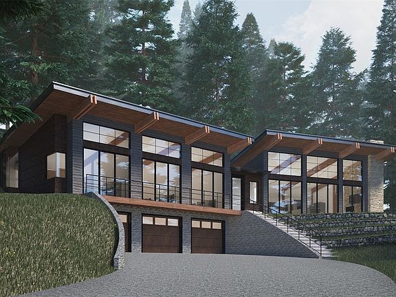 The fully permitted ''mountain contemporary' home design features an expansive great room with an open chef's kitchen, dining and living space with gas fireplace.  The design celebrates beautiful Douglas fir timber columns and beams that frame the western view of Red Mountain and Cle Elum Lake.   Large custom patio doors open upon an outdoor terrace.  An outdoor fireplace is provided overlooking the relaxing 'babbling brook' sounds of Bell Creek on the north side.>