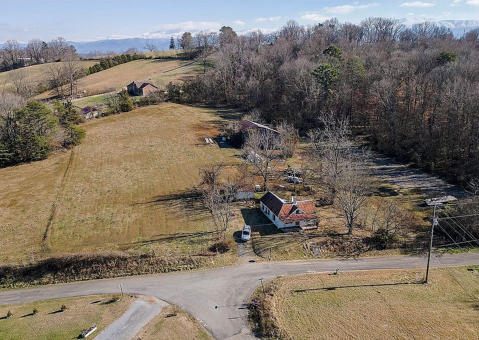 Home, outbuilding, and barn