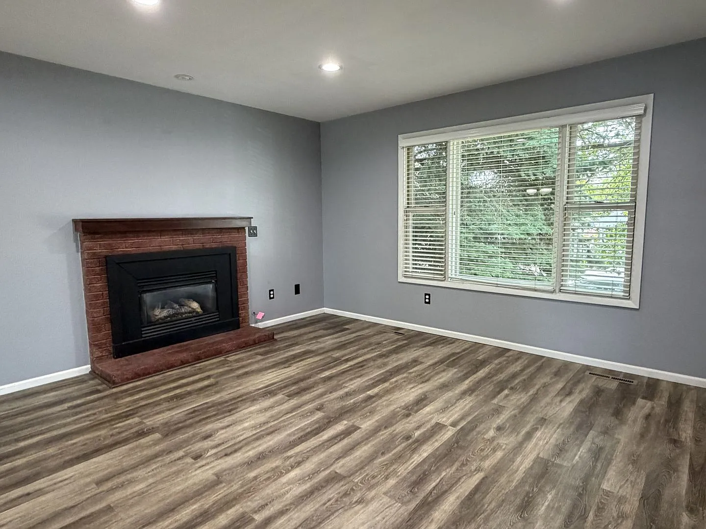 Spacious 3 Bed Home in Fort Collins | Fenced Yard, Fireplace & Finished Basement — Photo 4