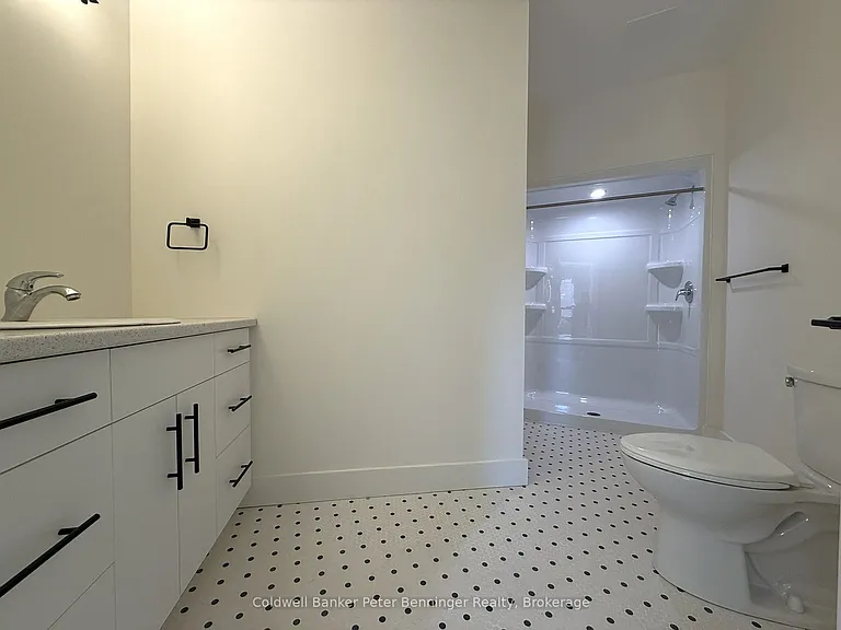 604 Queen St S #109 — Photo 13