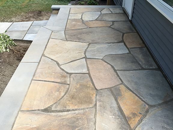 New fieldstone front porch