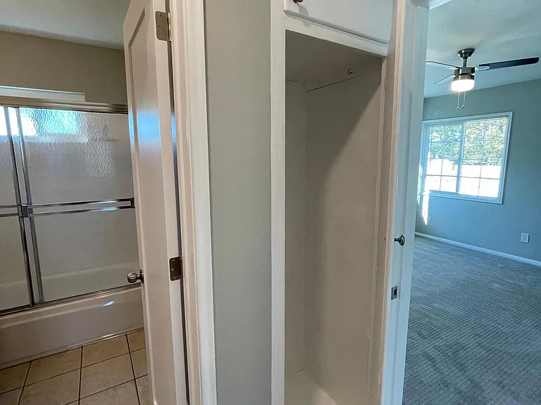 Hallway utility cabinet for extra storage.