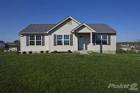 This cute & cozy ranch is situated on a huge lot with plenty of play space in the backyard.