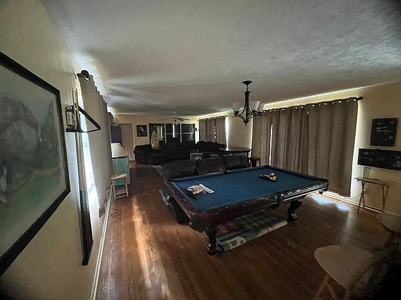 LIVING ROOM WITH NEW CURTAINS