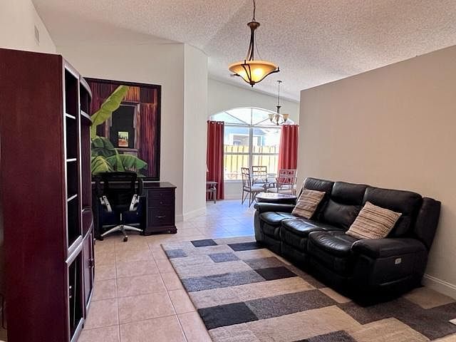 Spacious Living Room with Smart TV and dedicated work station