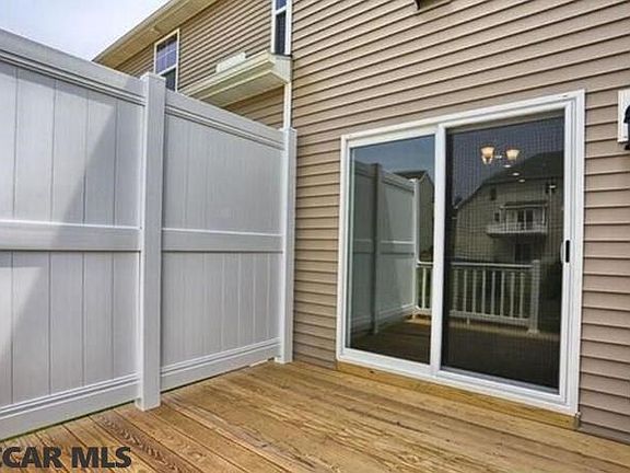 Home under construction. Completed home pictured.