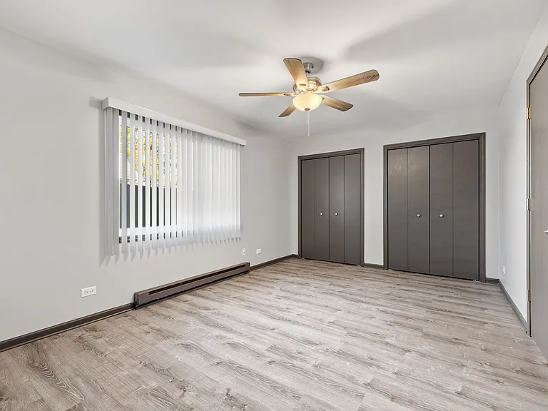 BEDROOM - View from back wall. 2 huge closets.