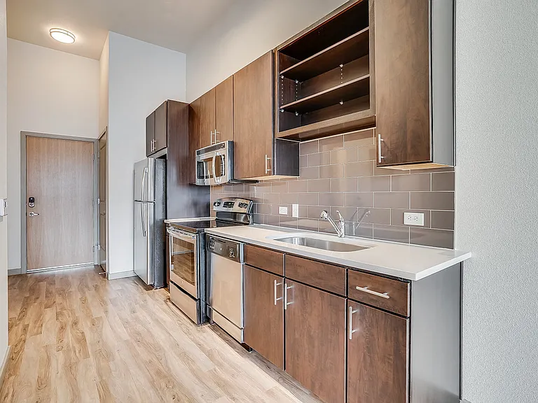 Stainless steel appliances and stunning backsplashes in kitchens