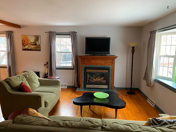 Open living room with gas fireplace