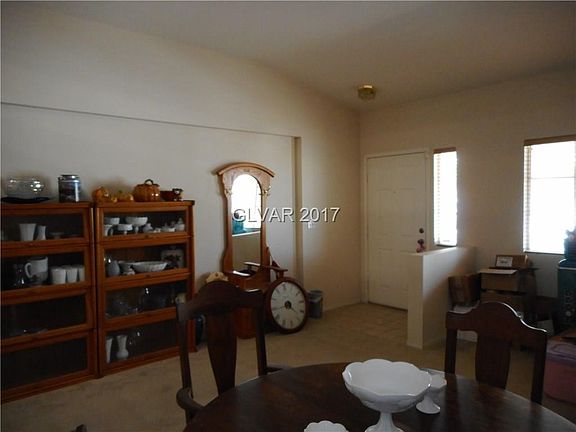 Front door entrance with tile entry. Sellers are in the middle of packing, excuse the boxes.