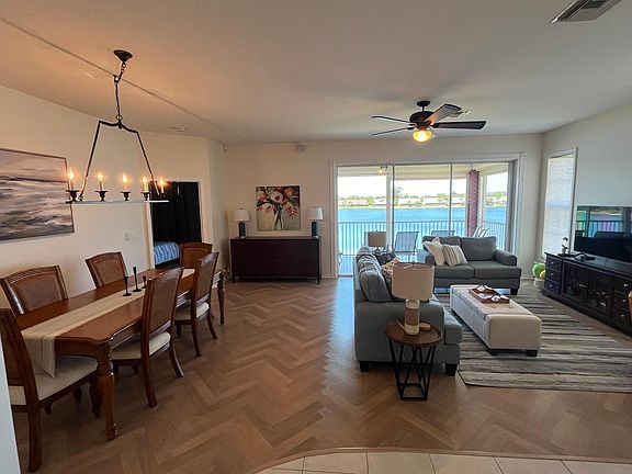Open living room / dining room with lake view