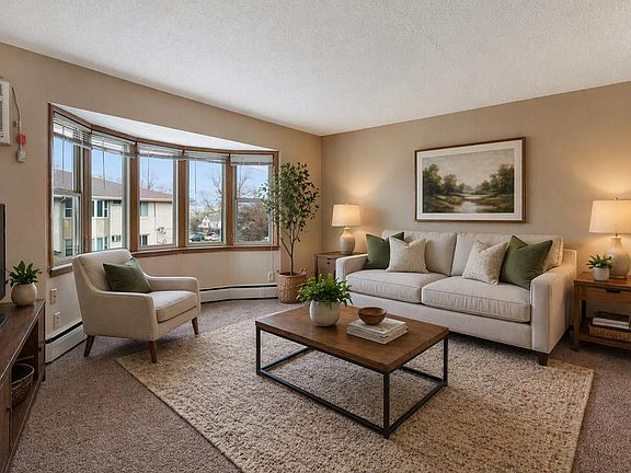 Furnished Living Room with Bay Window