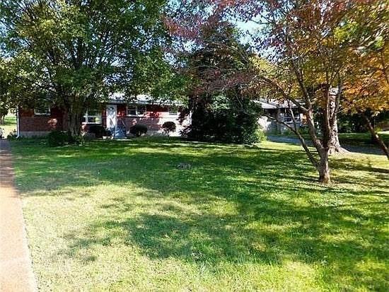 Large shaded front lawn