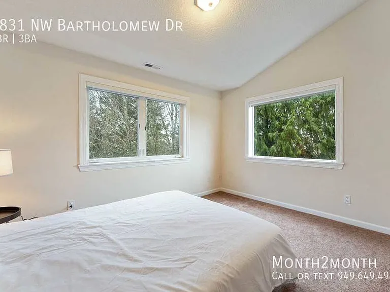 9831 NW Bartholomew Dr — Photo 15