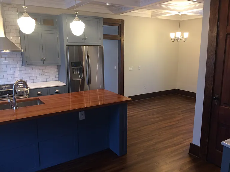 looking at the dinning area, very spacious, you can see the coffered ceilings in the whole kitchen area