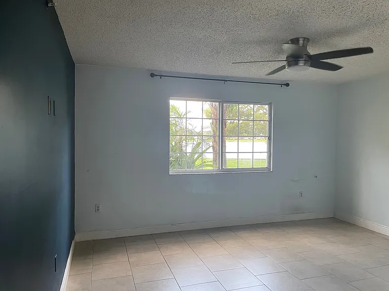 5005 Wiles Rd #102 — Photo 11