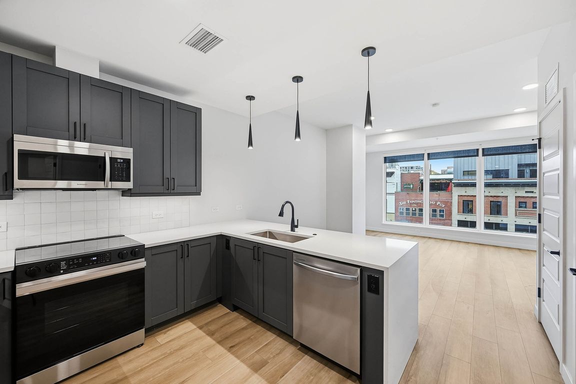 Modern kitchen with stainless steel appliances