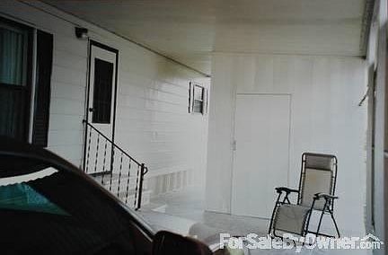 Carport & Shed
						:
						Side entrance to home from covered carport.