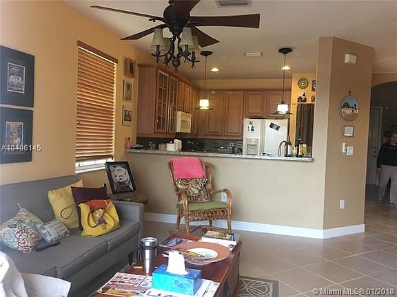 Family room and kitchen with wood kitchen cabinets and granite counter tops.One bedroom and full bathroom on the first floor.