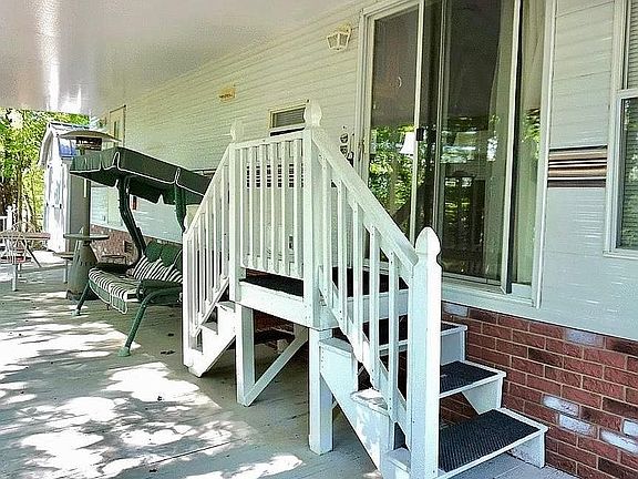 Entrance steps. Front door.