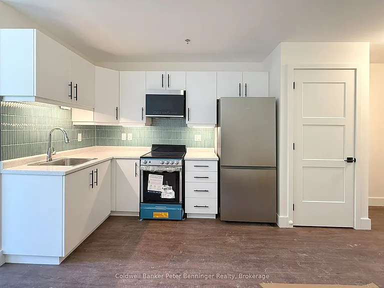 604 Queen St S #202 — Photo 1
