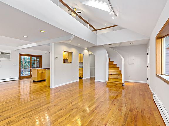 Living room with stairway to loft
