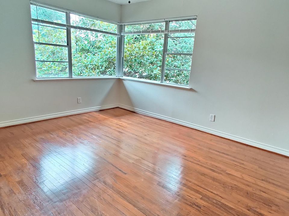 The large, light-filled bedroom