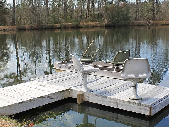 Pond(w/fish), dock, & boat