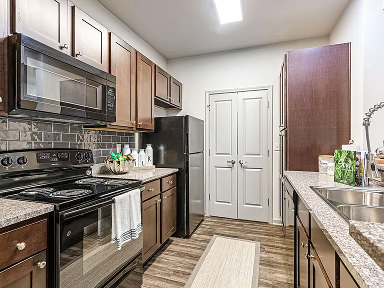 Kitchen with granite-style counters