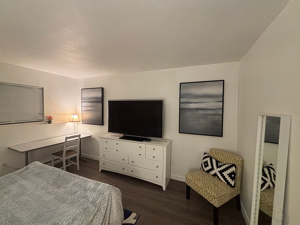 Large tv in the master bedroom.