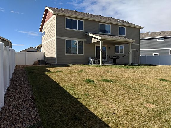 Huge, fenced backyard with covered patio
