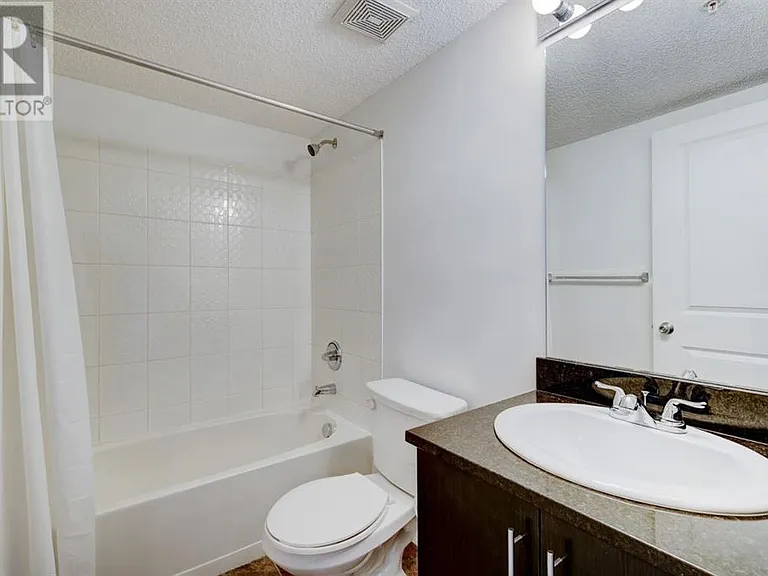 403 Mackenzie Way SW #7210 — Photo 18