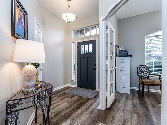 Your entry is light and bright with a nearby coat closet.