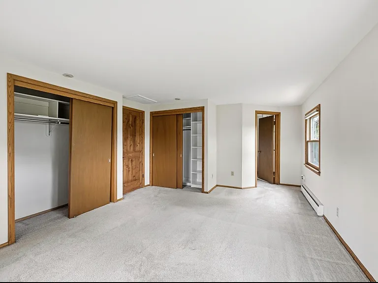 Master Bedroom with remote Blinds and Master Bathroom