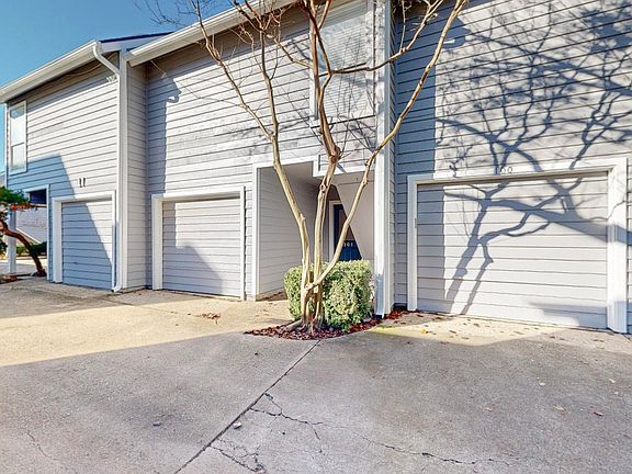 Center unit it photo with private one car garage.